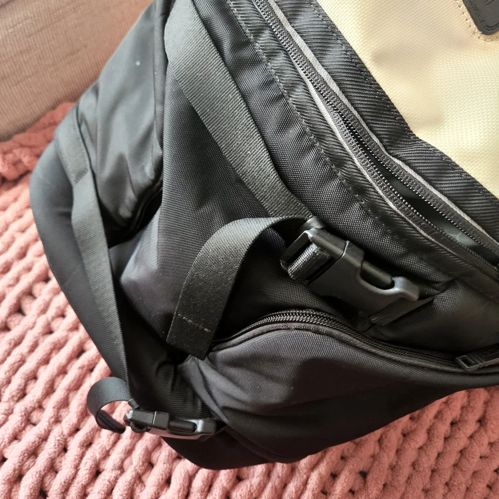 Tumi Black and Cream Backpack